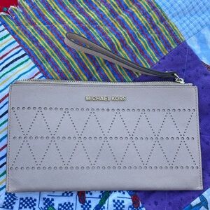 Michael Kors Beige Wristlet with Gold Accents